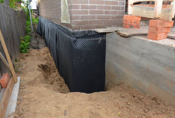 Happy homeowners after waterproofing job in Fox Lake